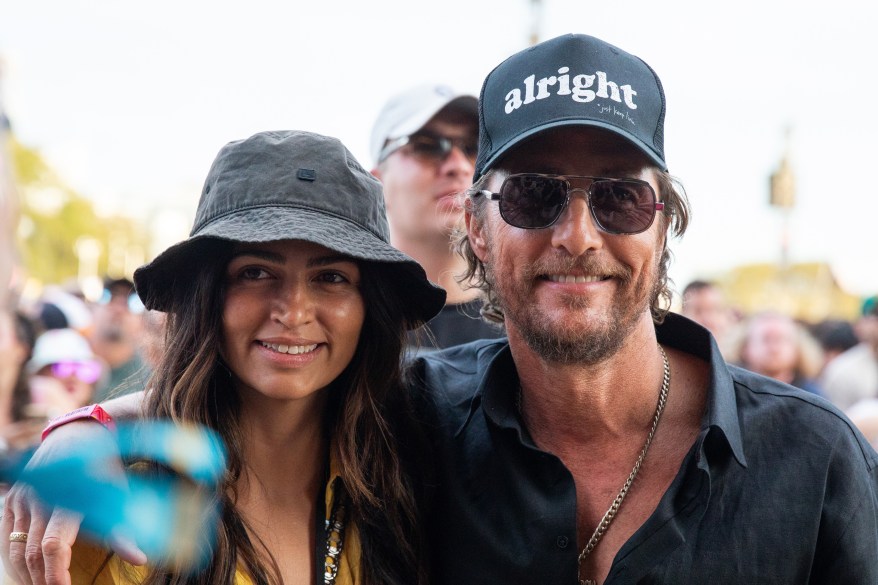 DAZED AND ENTHUSED: Texas’ unofficial spokesperson  Matthew McConaughey heads back home with wife Camila Alves for a music festival.
